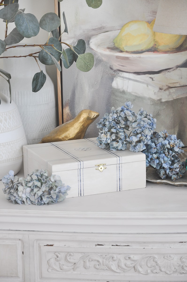 vintage cigar box makeover | striped storage box on coffee table | diy decor