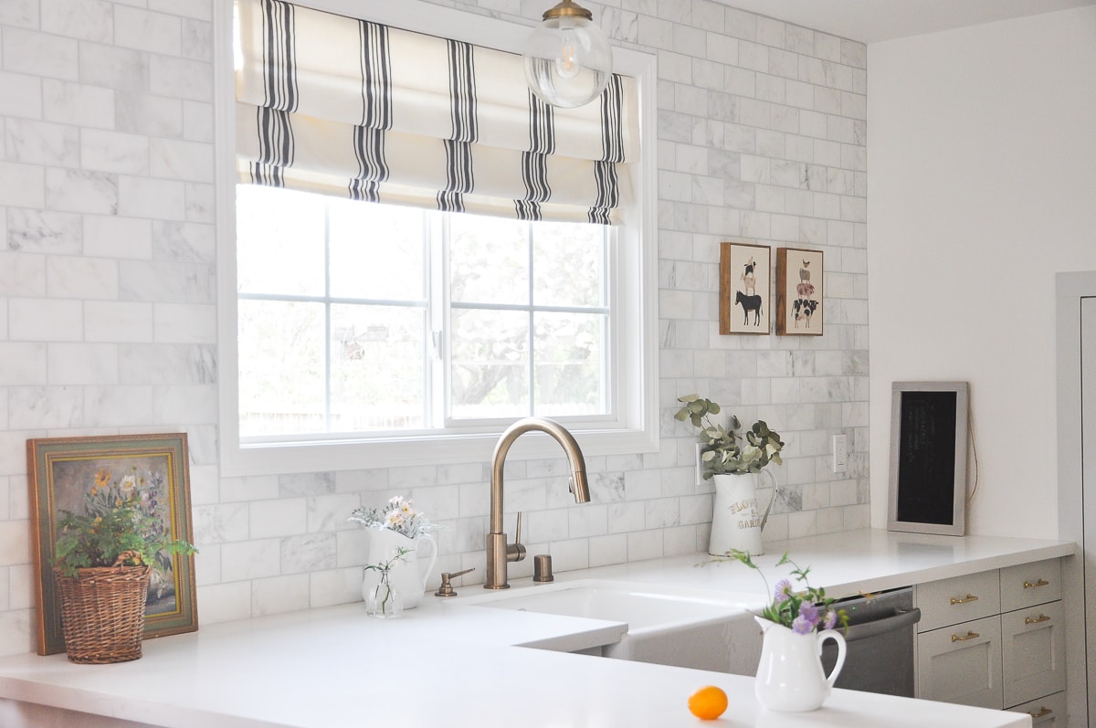 roman shades over kitchen sink