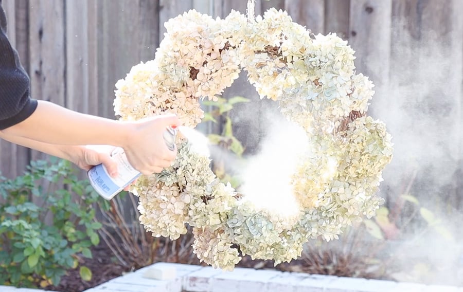 dried hydrangeas wreath with floral spray
