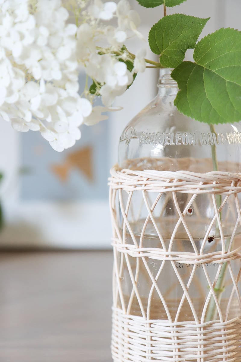 wicker covered glass bottles