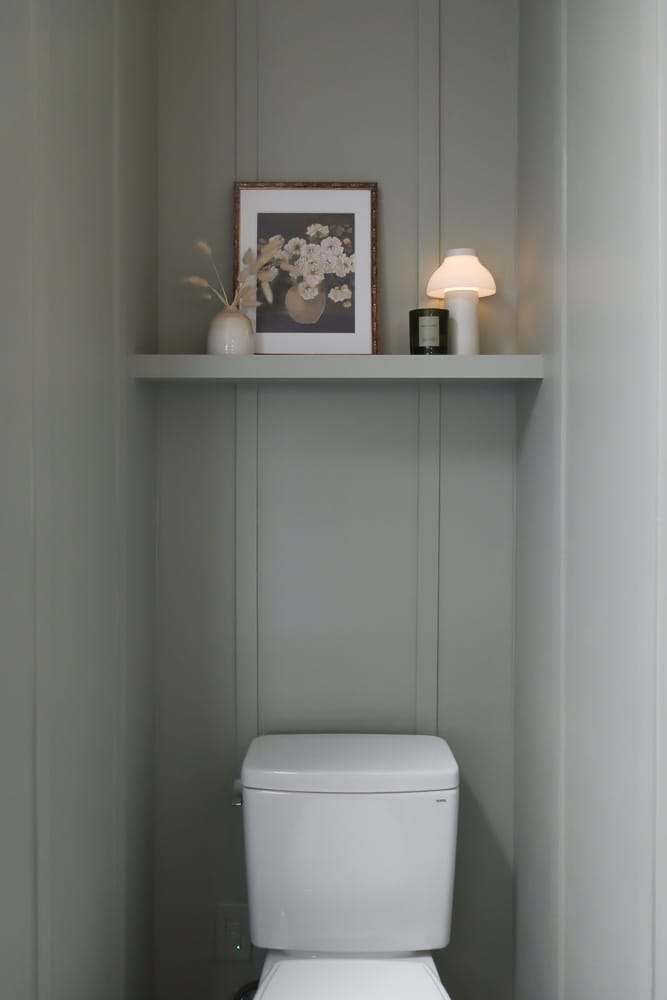 Floating shelf store over toilet