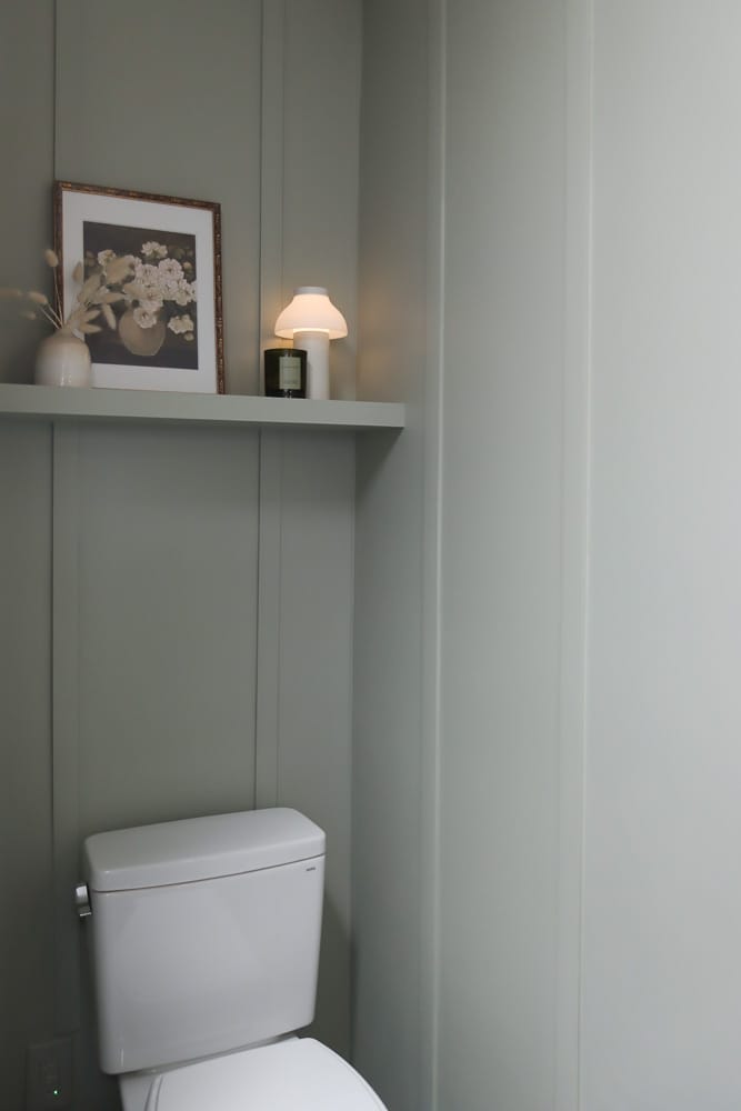 DIY open shelf in toilet nook to add vertical storage