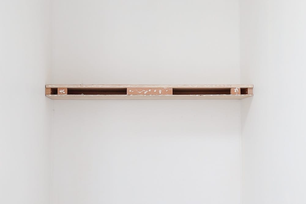 DIY floating shelf that is wall to wall