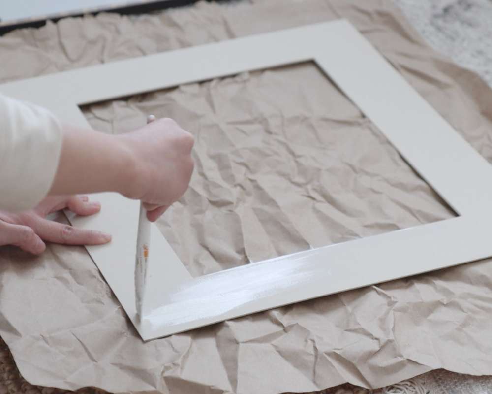 how to update old picture frames diy picture frame makeover - painting the matte frame white