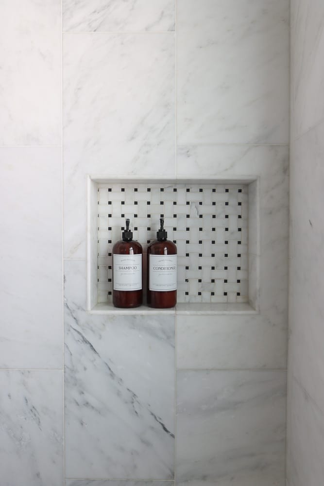 white grout color on white marble tile