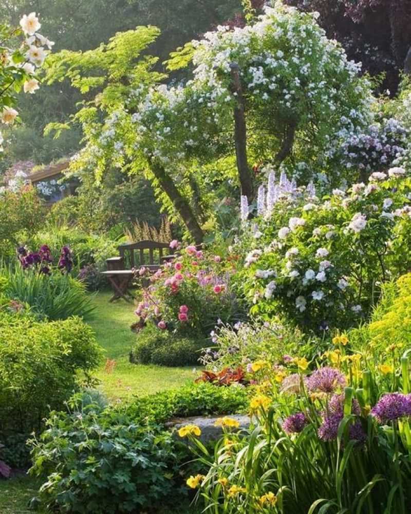 Fairytale English Cottage Garden Ideas, abundance of colorful flowers, lush greenery